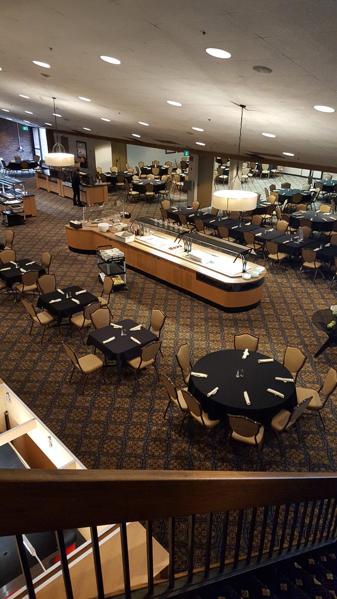 Elegant dining room with patterned carpet