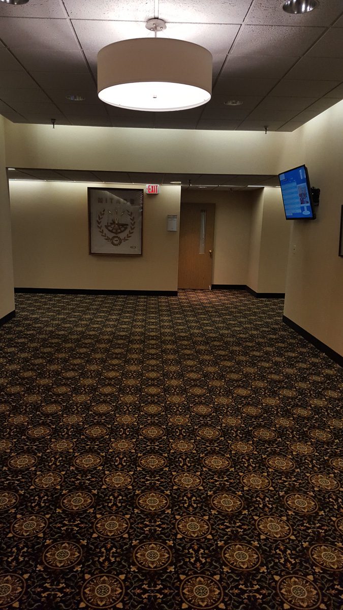 Empty hallway in dim lighting