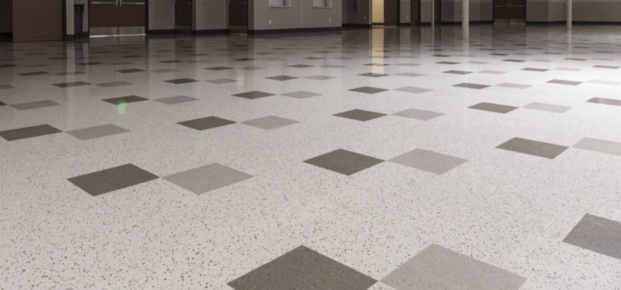 Tiled floor with geometric pattern design.